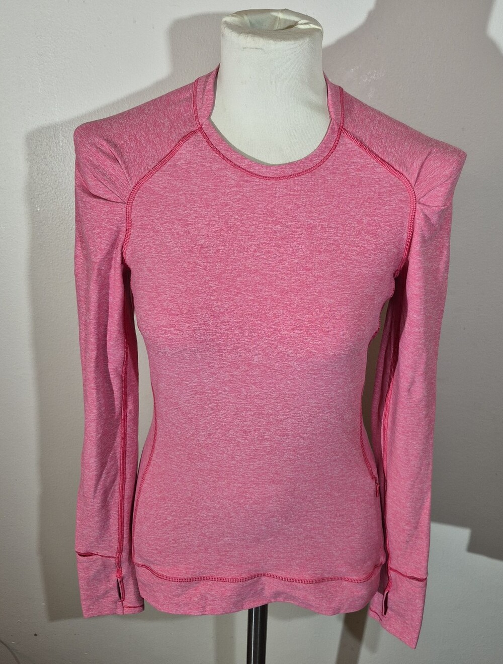 6) Lululemon Think Fast Pink Pleated Shoulder Long Sleeve Top